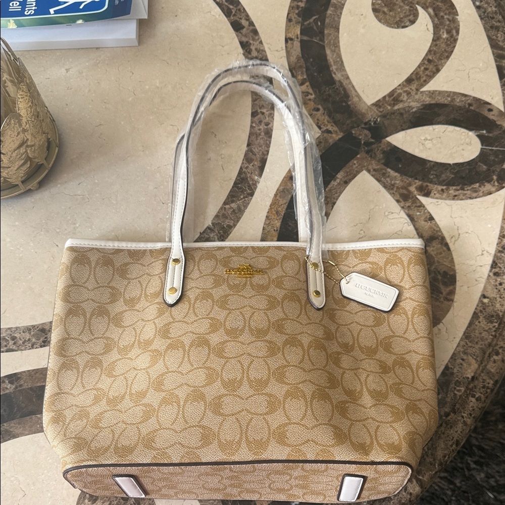 New never used Tan and White Signature Tote